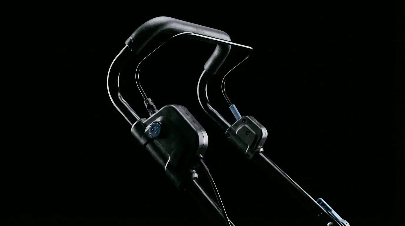 TURFSPIN™ Cordless Artificial Turf Sweeper handle and control panel on black background