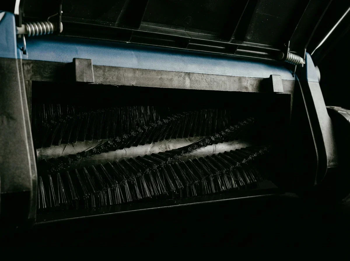 TURFSPIN™ cordless artificial turf sweeper brush close-up for synthetic grass cleaning