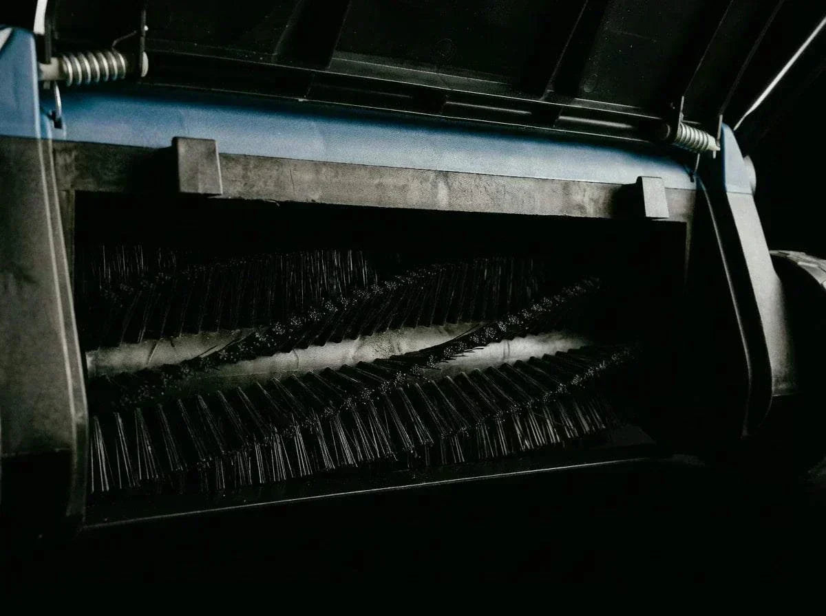 TURFSPIN™ Cordless Artificial Turf Sweeper lifting debris and restoring synthetic grass fibers without cords or chemicals