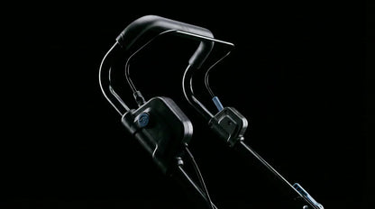 TURFSPIN™ Cordless Artificial Turf Sweeper handle and control panel on black background